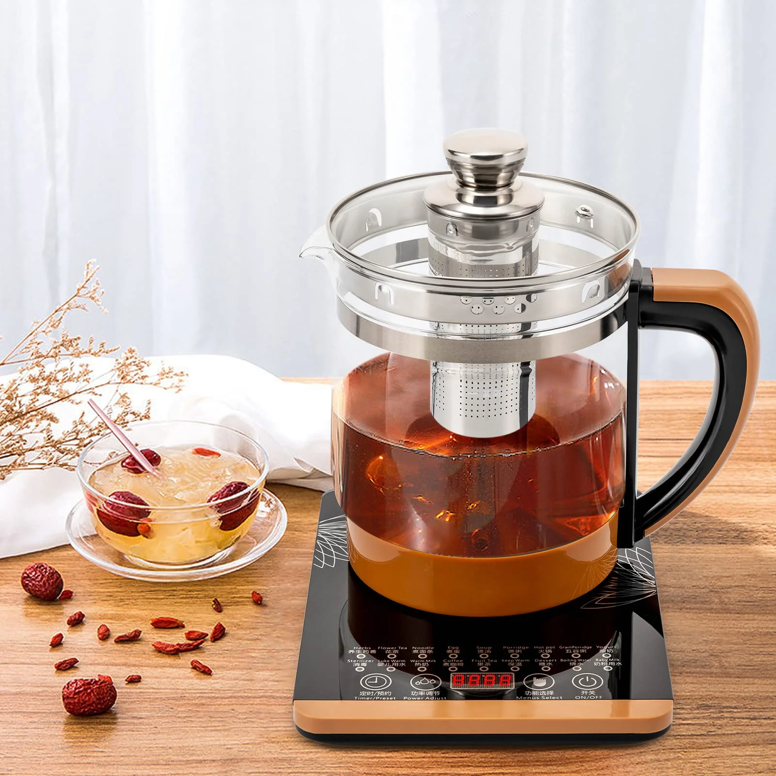 Stainless steel electric kettle boiling water on a kitchen counter